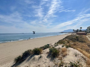 Refugio costero en primera línea de playa